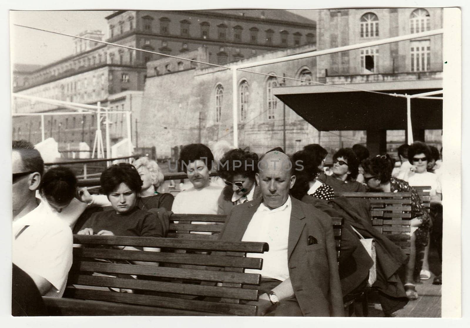 Vintage photo shows people on vacation. by roman_nerud