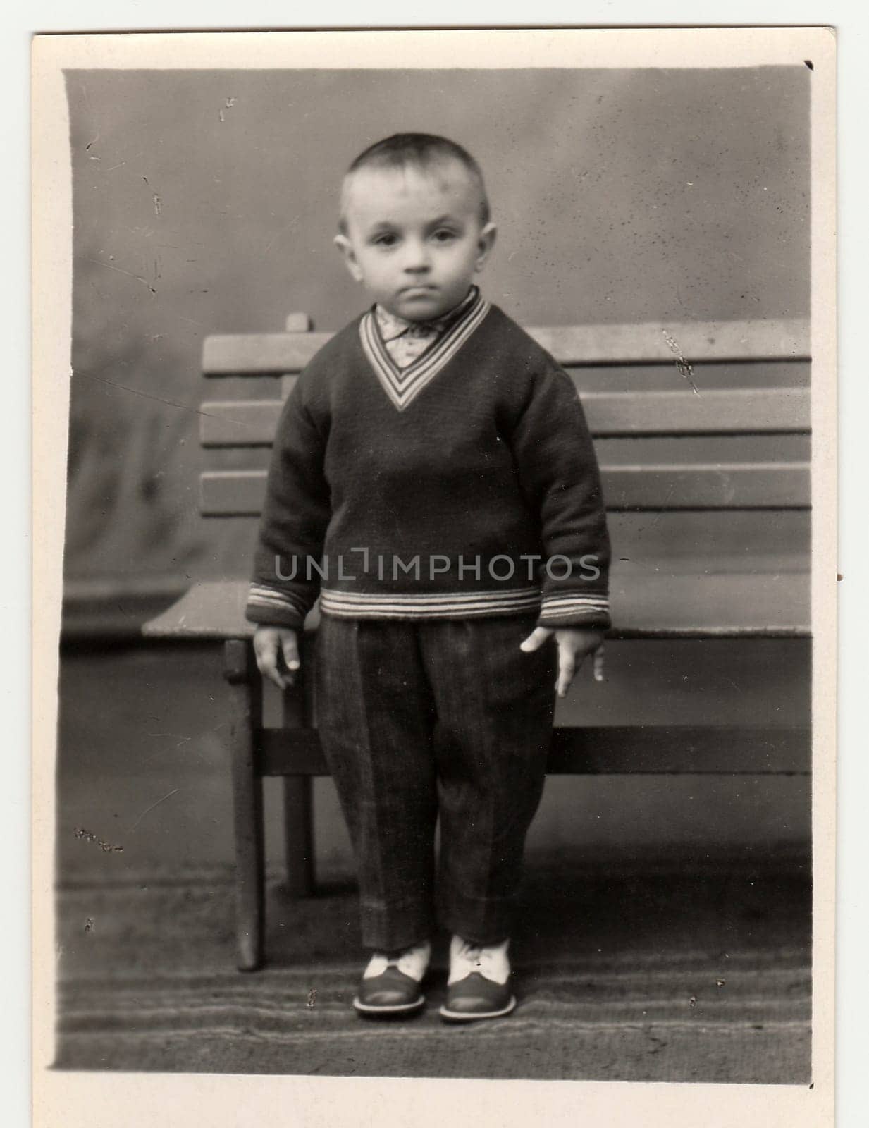 Vintage studio photo of a small boy. by roman_nerud