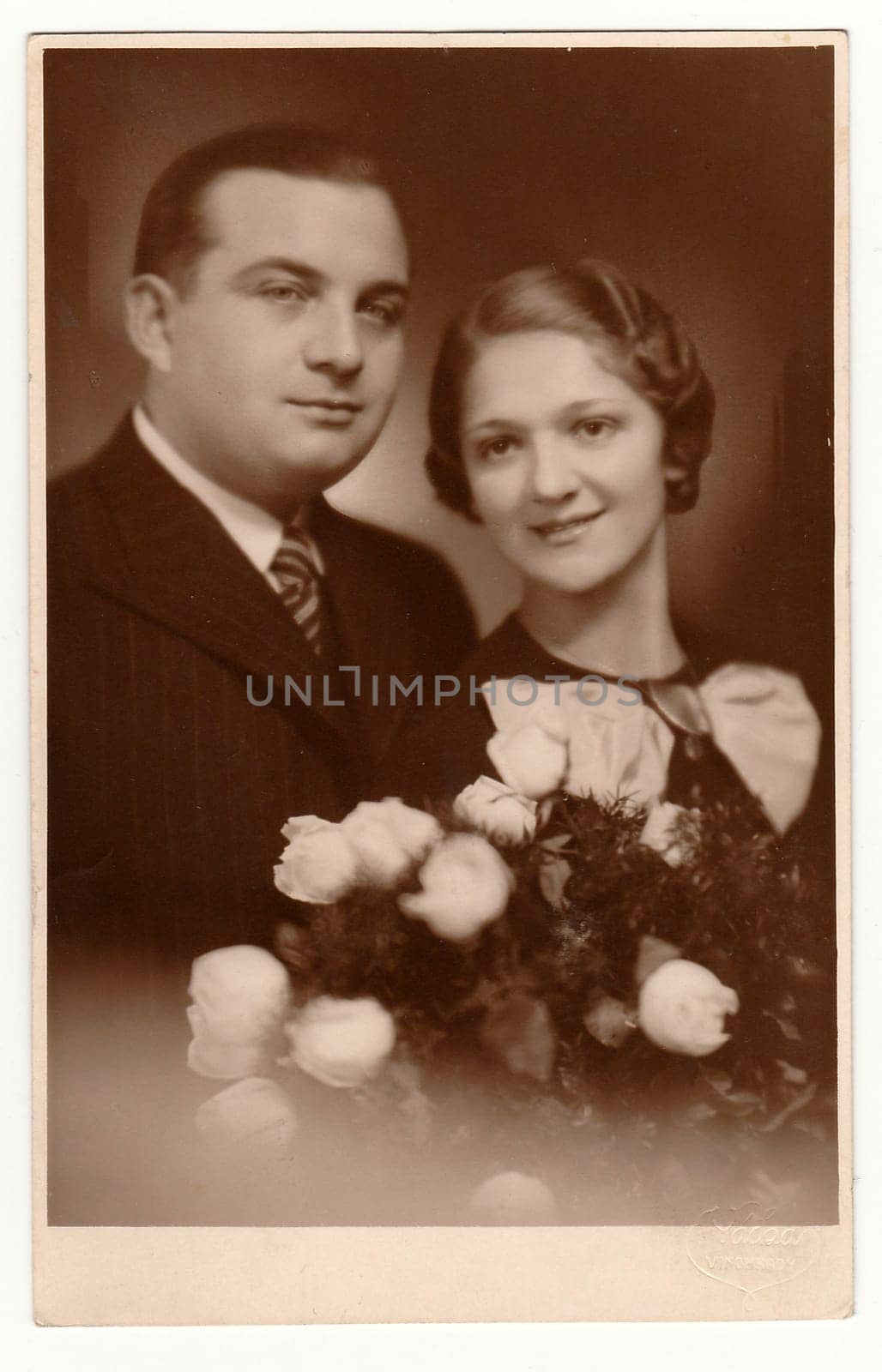 PRAGUE, THE CZECHOSLOVAK REPUBLIC - NOVEMBER 17, 1934: Vintage photo shows marrital couple.