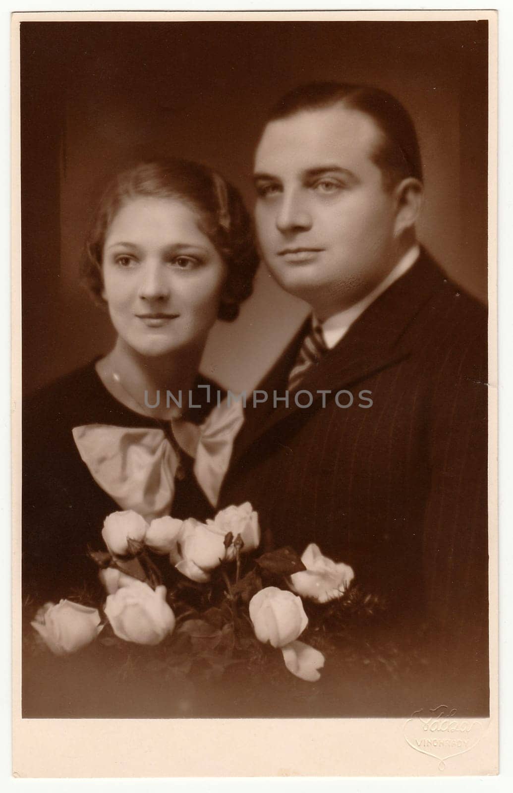 PRAGUE, THE CZECHOSLOVAK REPUBLIC - NOVEMBER 17, 1934: Vintage photo shows marrital couple.