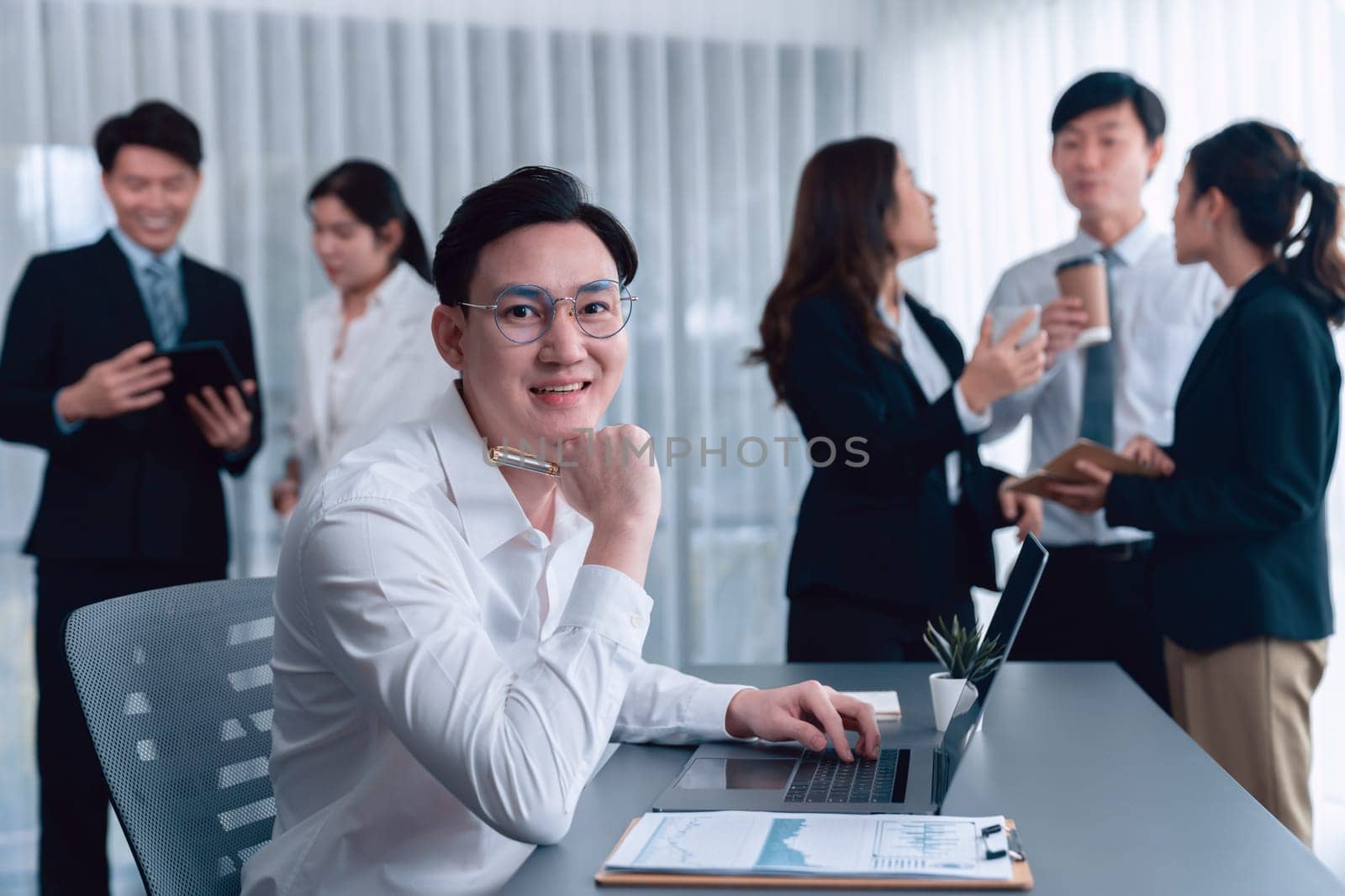 Portrait of focus successful confident male manager in harmony office. by biancoblue