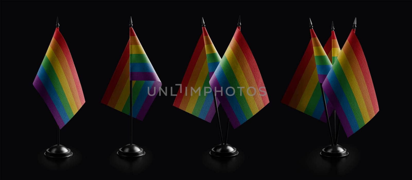 Small national flags of the lgbt on a black background.