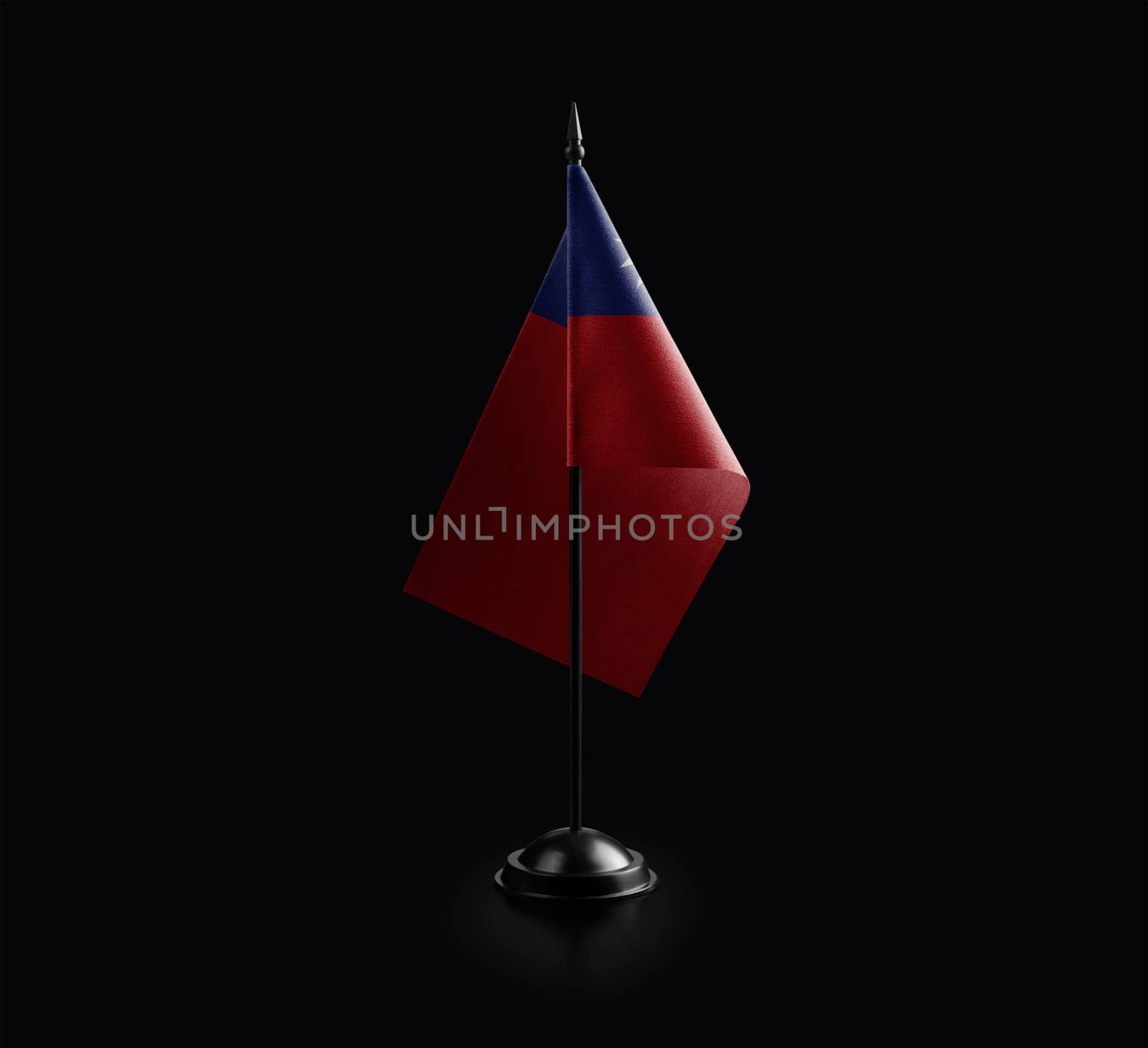 Small national flag of the Taiwan on a black background.