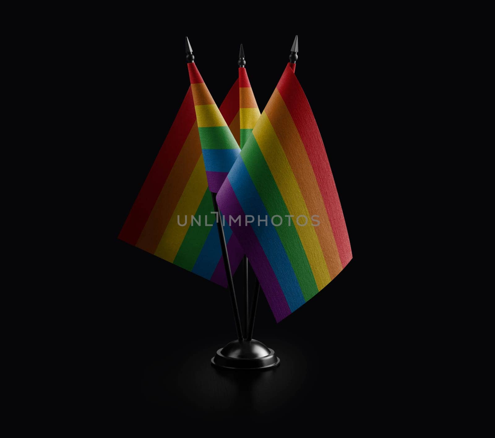 Small national flags of the lgbt on a black background.
