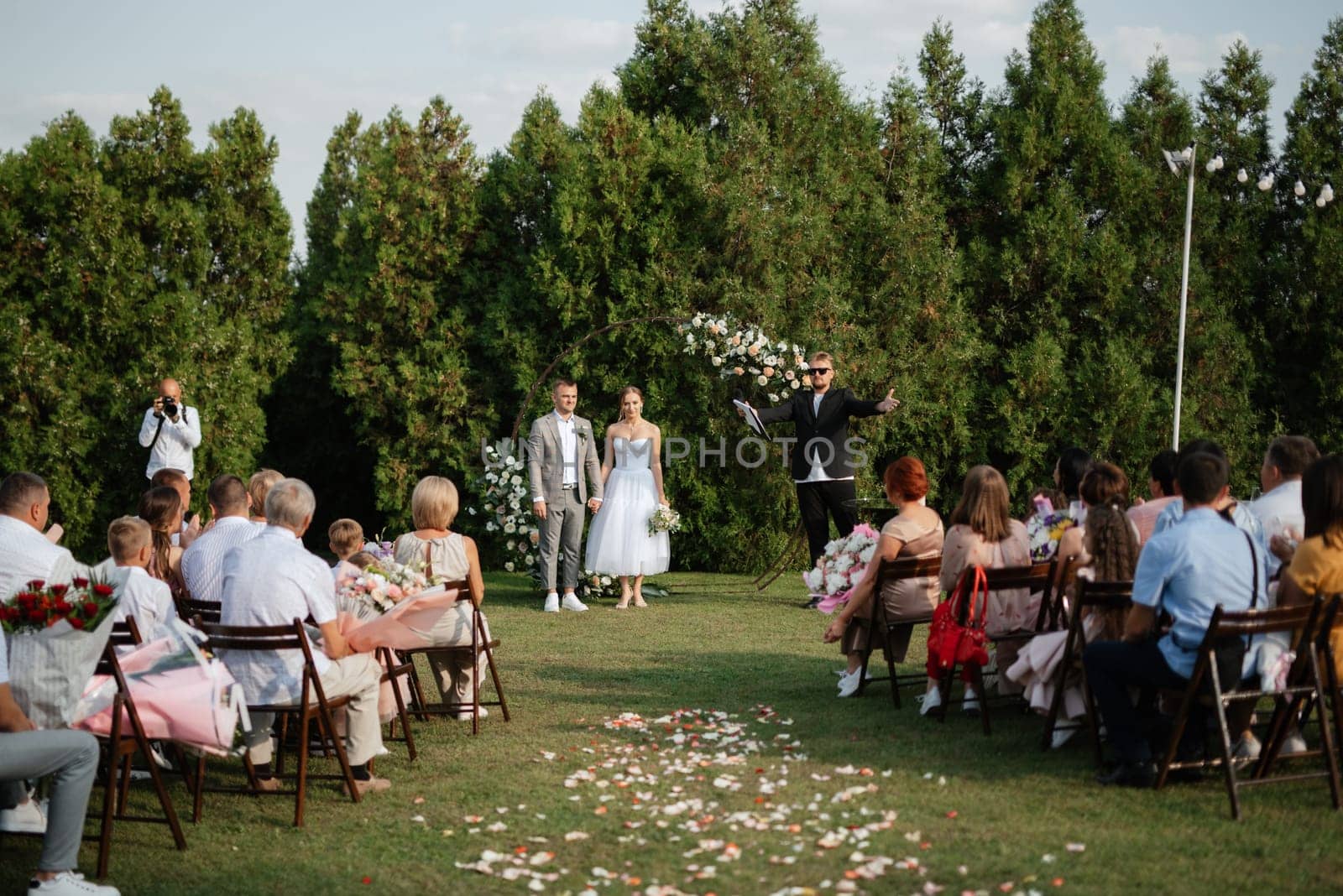 wedding ceremony of the newlyweds on the glade by Andreua