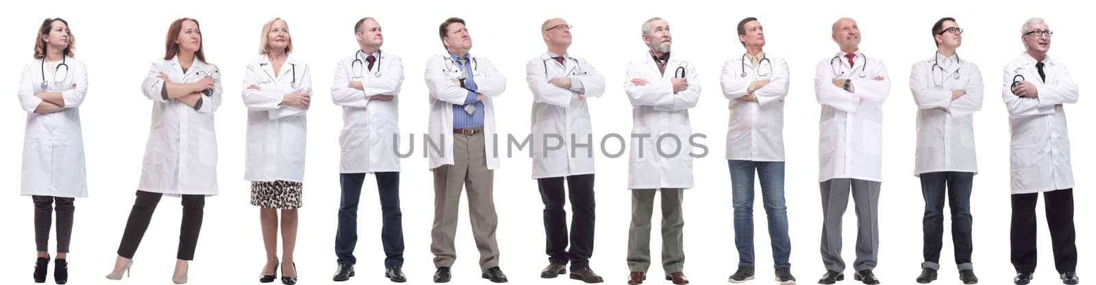 group of doctors standing in full length isolated on white background