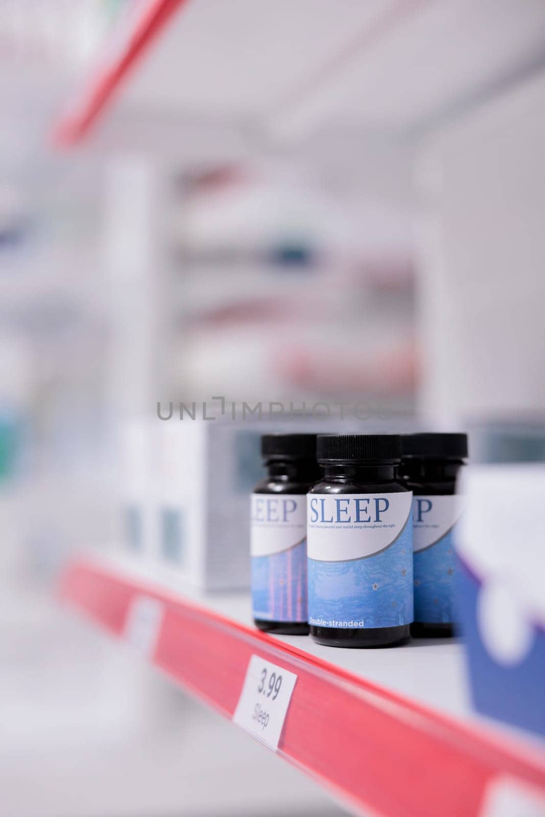Health care store shelves filled with medicaments and pharmaceutical products by DCStudio
