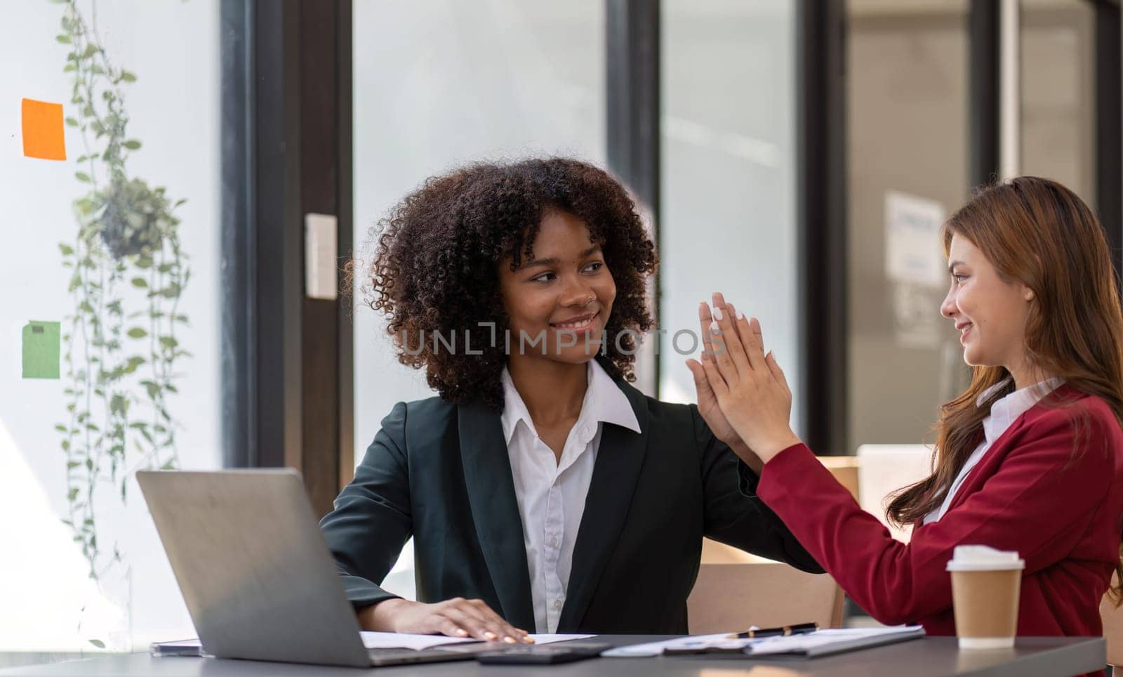 Happy smiling businessman feel happy work complete Teamwork success at work in the office concept by nateemee