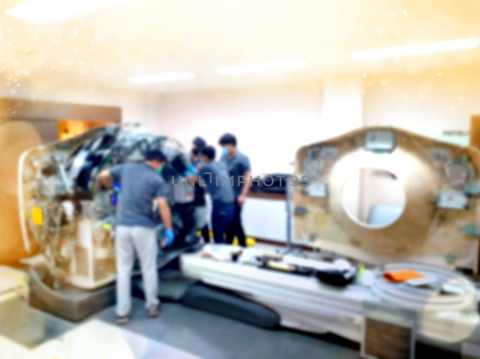 Maintenance engineer repairing and checking The CT scanner machine in the hospital. Services concept.