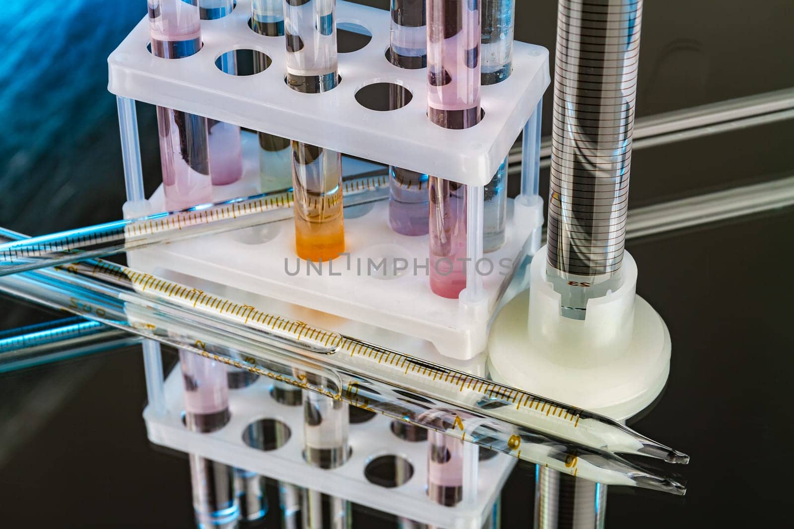 Stand with test tubes and pipette for lab research. Science medical equipment concept.