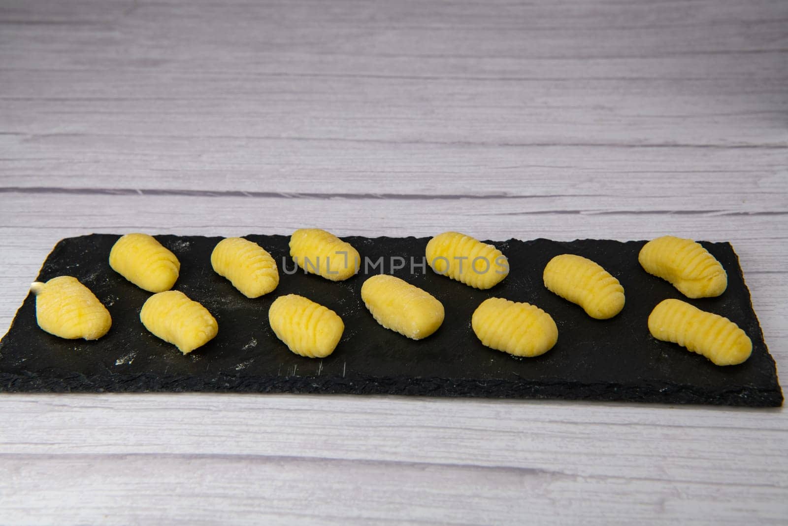 Pile of yellow eggs gnocchi Gnocci potato peru italian food, High quality photo