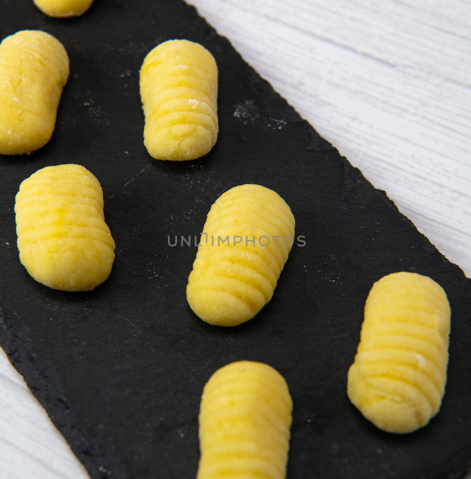 Pile of yellow eggs gnocchi Gnocci potato peru italian food, High quality photo