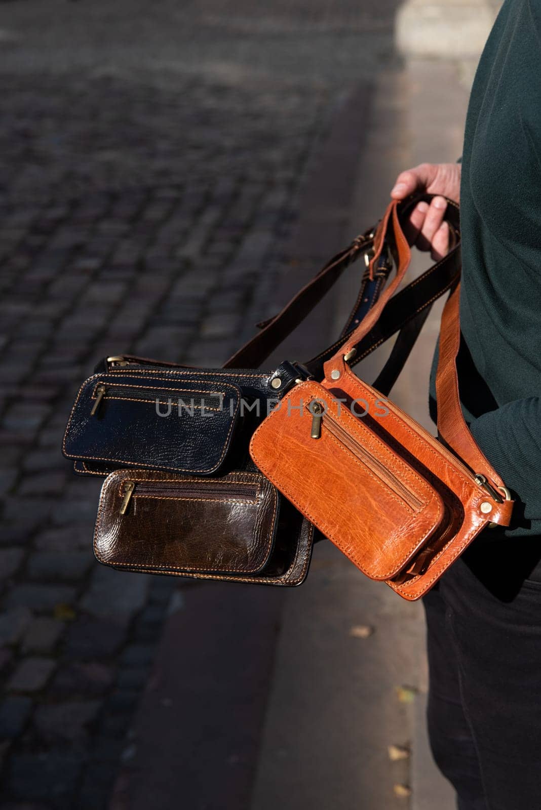 Three men's black leather hip crossbody belt bags. black, brown, foxy colours