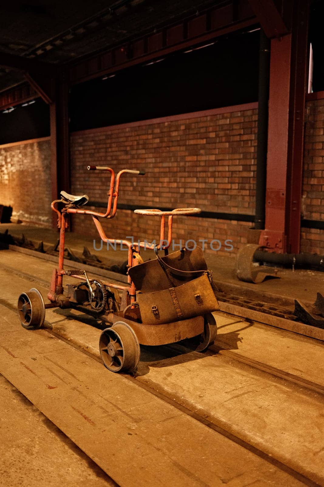 Vertical shot of an industrial trolley on the rail in Ruhr mine, Germany