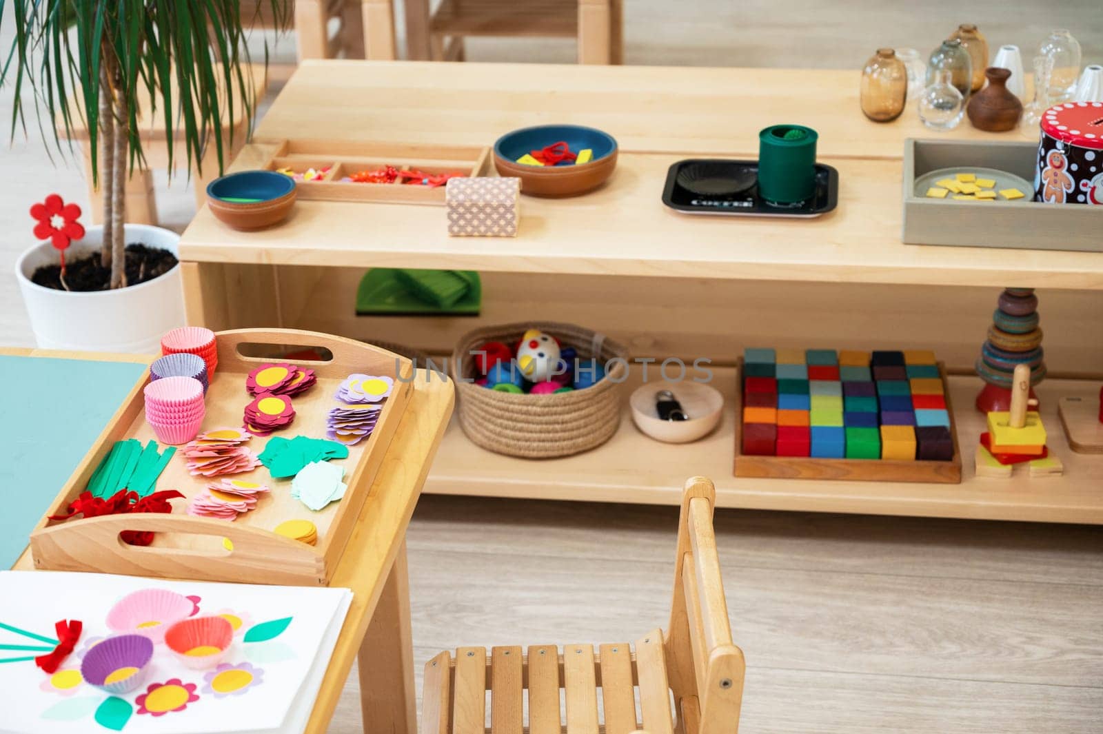 Classroom of Montessori kindergarten. The colorful Montessori material. Concept of children learning toy