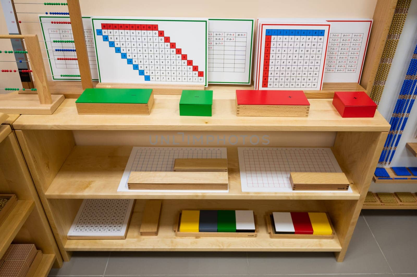 Classroom of Montessori kindergarten. The colorful Montessori material. Concept of children learning toy