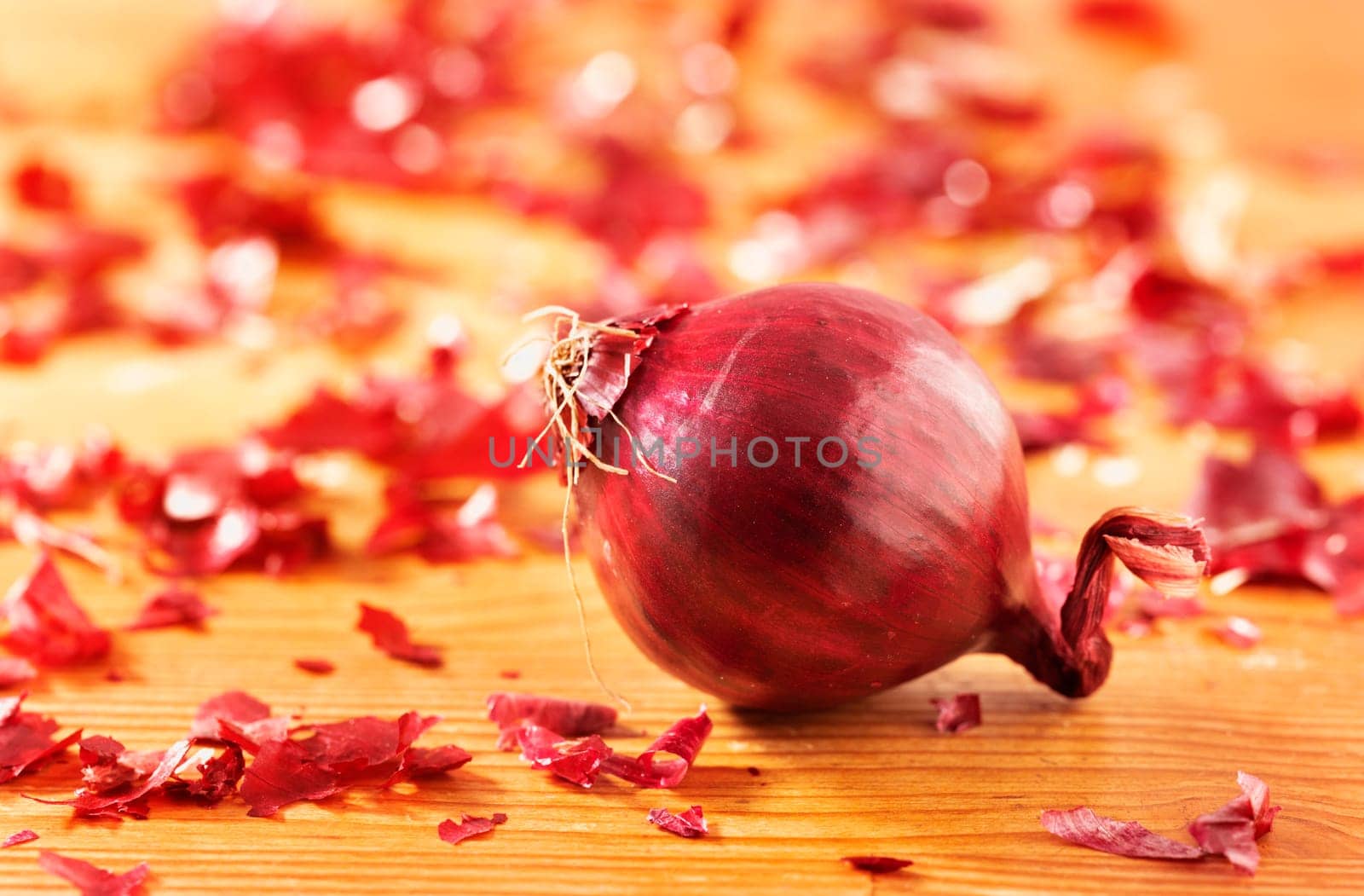 Red onion on table by victimewalker