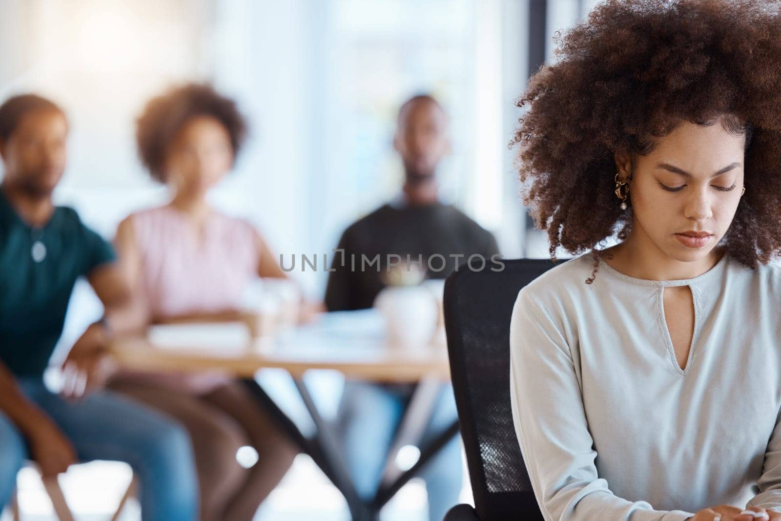 Workplace bullying, anxiety and gossip of businesswoman with depression, mental health and sad victim exclusion by employees in company office. Lonely, depressed and harassment worker discrimination.