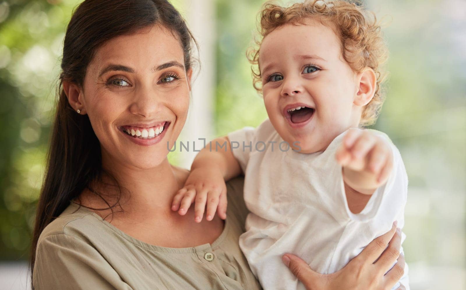 Family, baby and love with a mother and son in their home with a smile and feeling happy or excited together. Portrait, children and cute with a woman and her adopted boy child bonding in their house.
