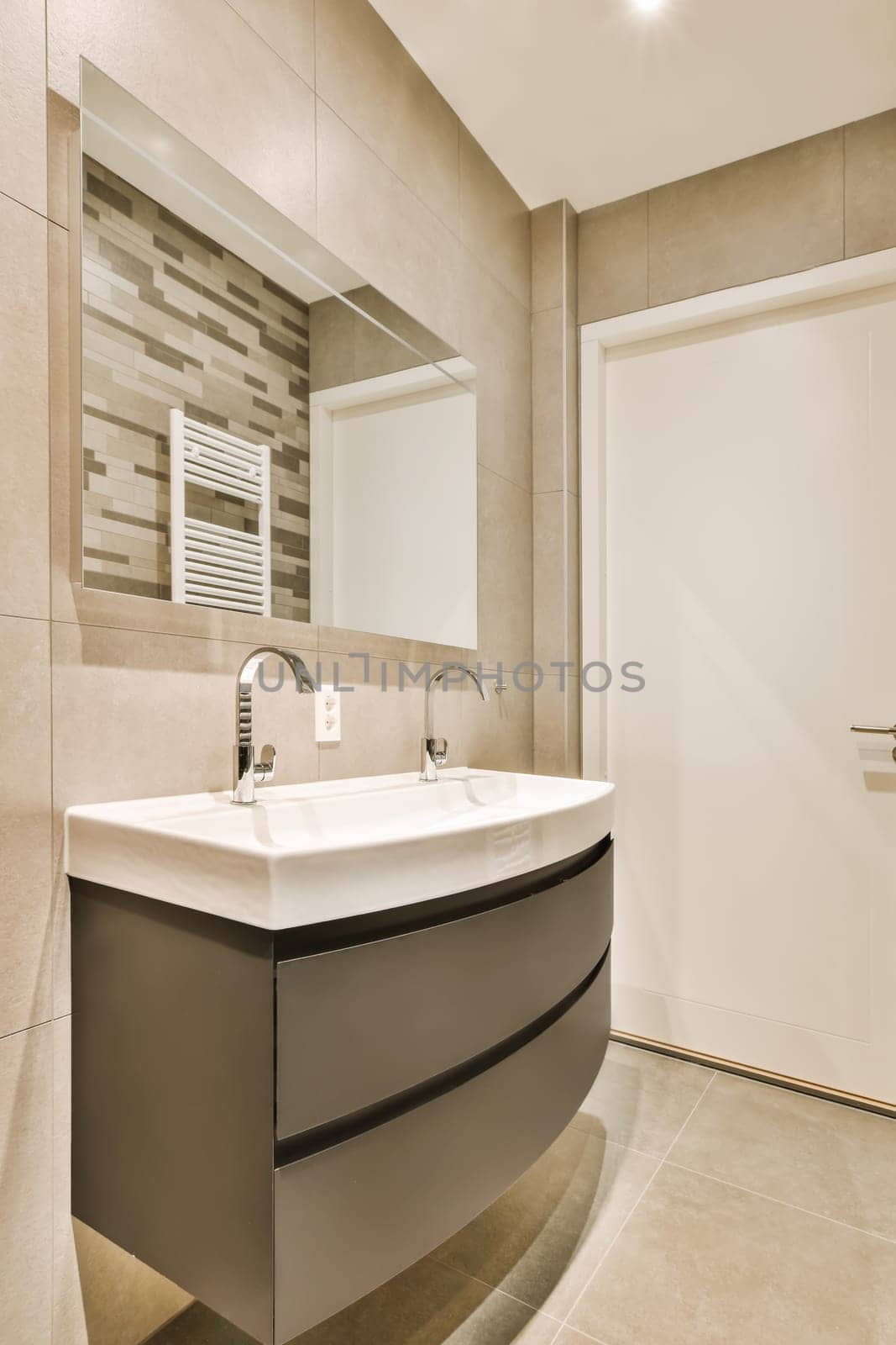 a bathroom with a sink and mirror on the wall next to an open door that leads to a walk - in shower