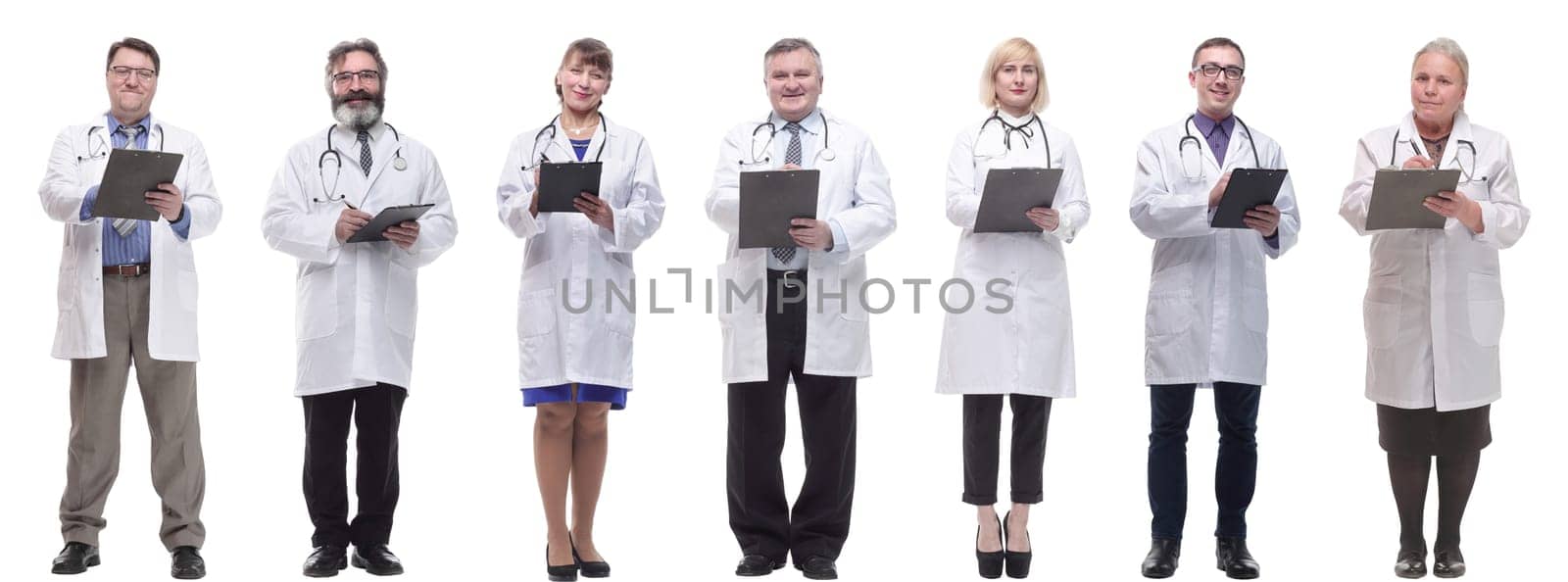 group of doctors in full length isolated on white background