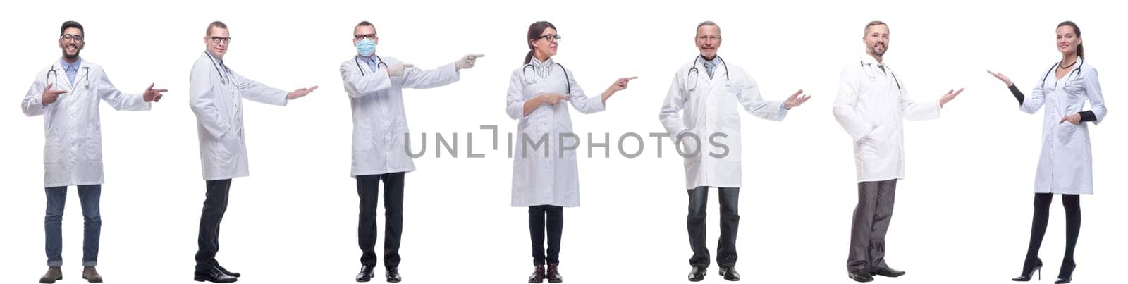 group of doctors in full length isolated on white background