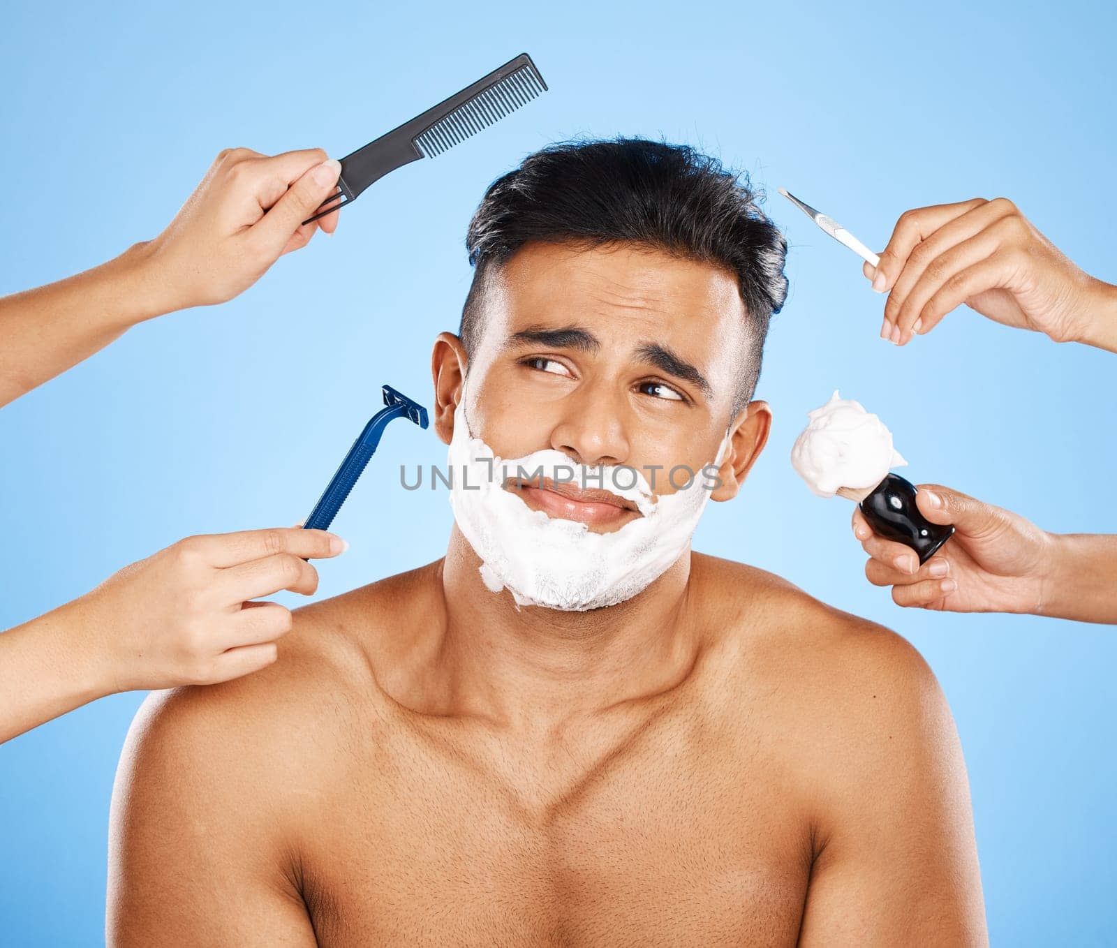 Hands, cleaning and man in studio for makeover, skincare and shaving against a blue background. Hand, beauty and luxury with wellness model grooming, hair and skin treatment with cosmetic product.