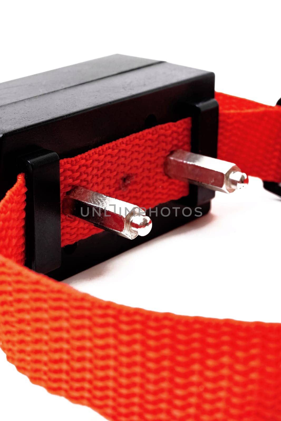 Red collar with electric shock for a dog isolated on white background