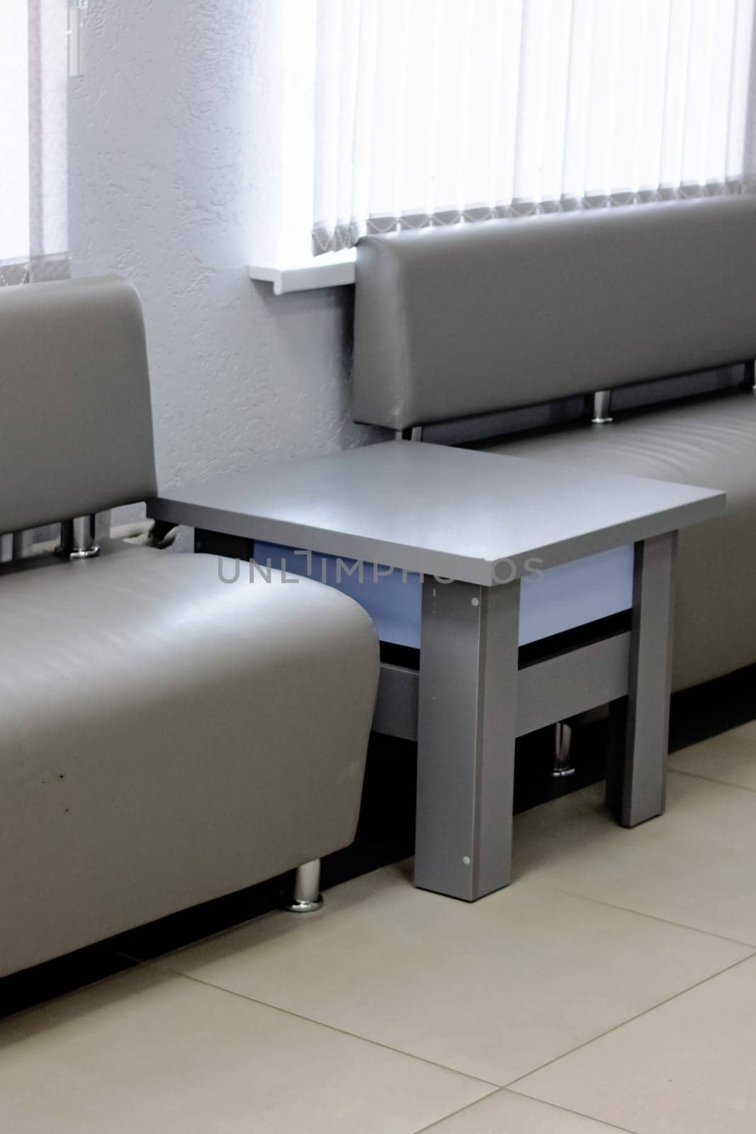 Sofas and tables in the waiting room close up