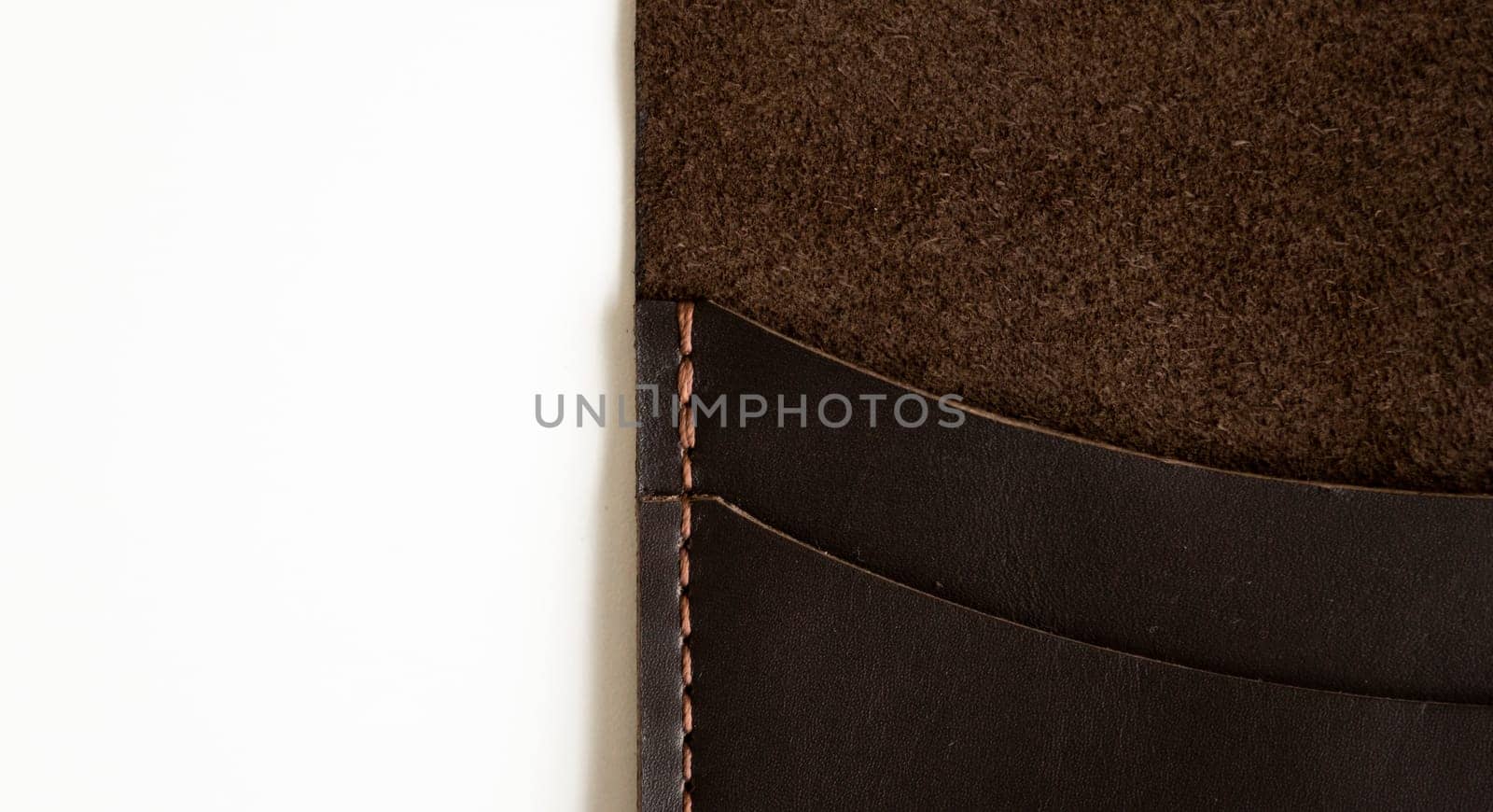 Details of open brown elegance men's wallet on a white background. Mens leather accessories