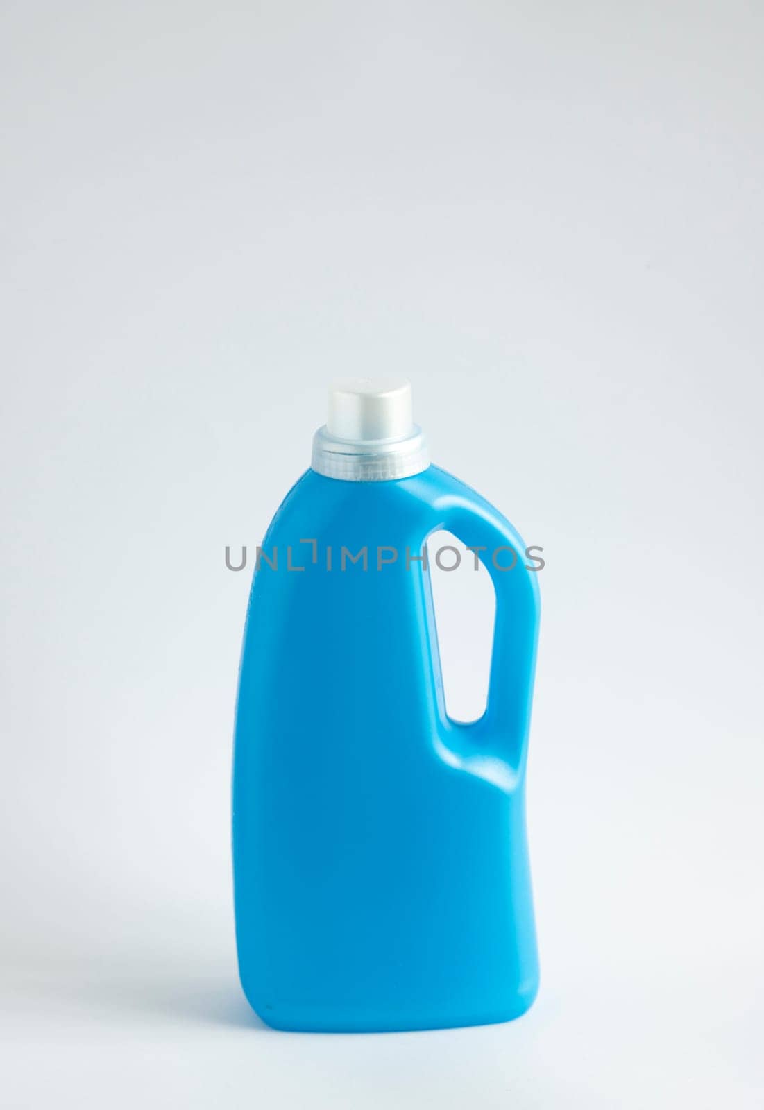 Blue plastic liquid detergent bottle isolated on white background. Laundry container, merchandise template. Product design. Mock up. by vovsht