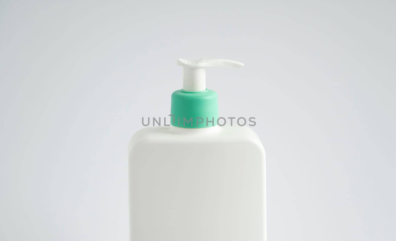 Close up liquid container for shampoo, gel, lotion, cream, bath foam etc. Blank unbranded cosmetic plastic bottle with dispenser pump