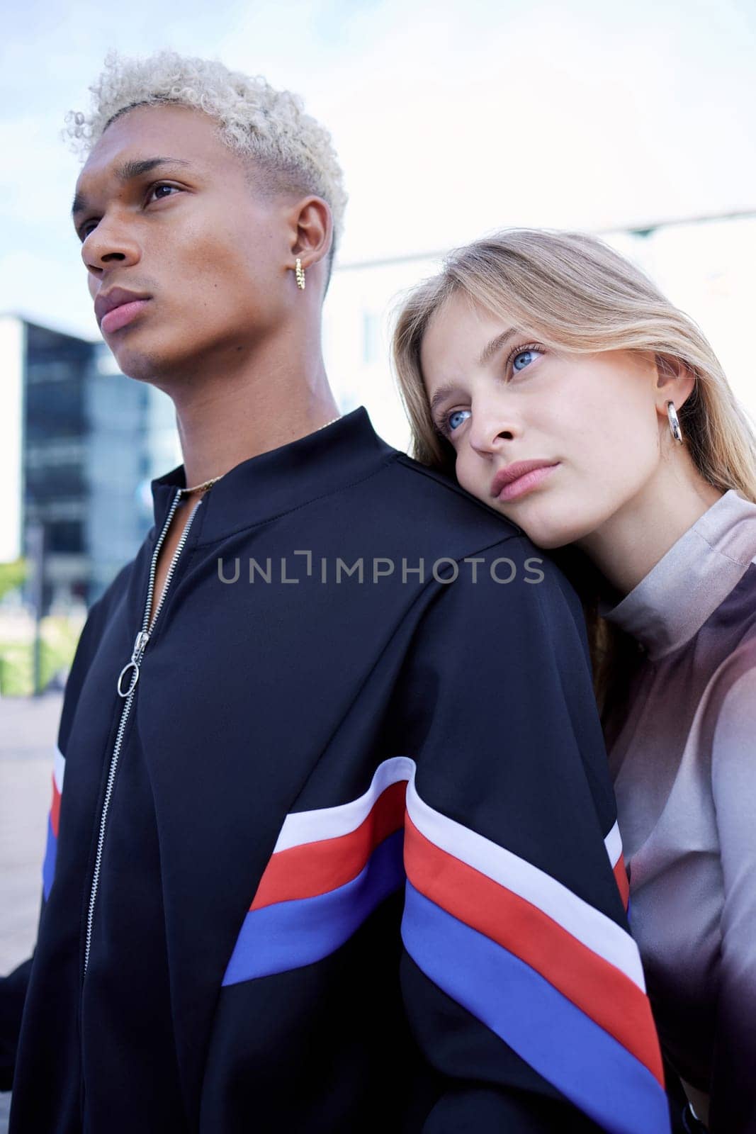 Couple love, serious and street fashion modern gen z or edgy millennial style in city together. Young man and woman, diverse fashionable friends and cool trendy youth outdoor designer wear lifestyle.