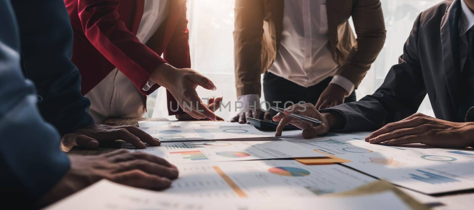 Business People Meeting using laptop computer,calculator,notebook,stock market chart paper for analysis Plans to improve quality next month. Conference Discussion Corporate Concept....