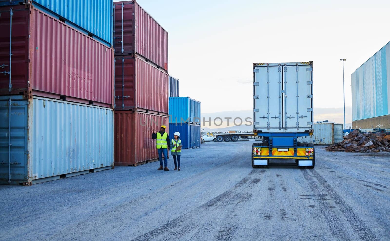 Delivery, leadership and logistics manager with worker speaking on shipping cargo, stock or inventory outdoors, Industry employee talking to foreman on truck transportation services in Dallas, USA.