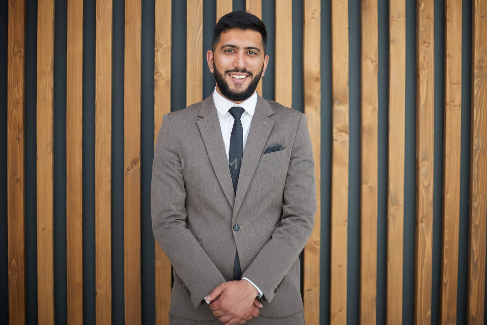 successful businessman on the background of a modern office.