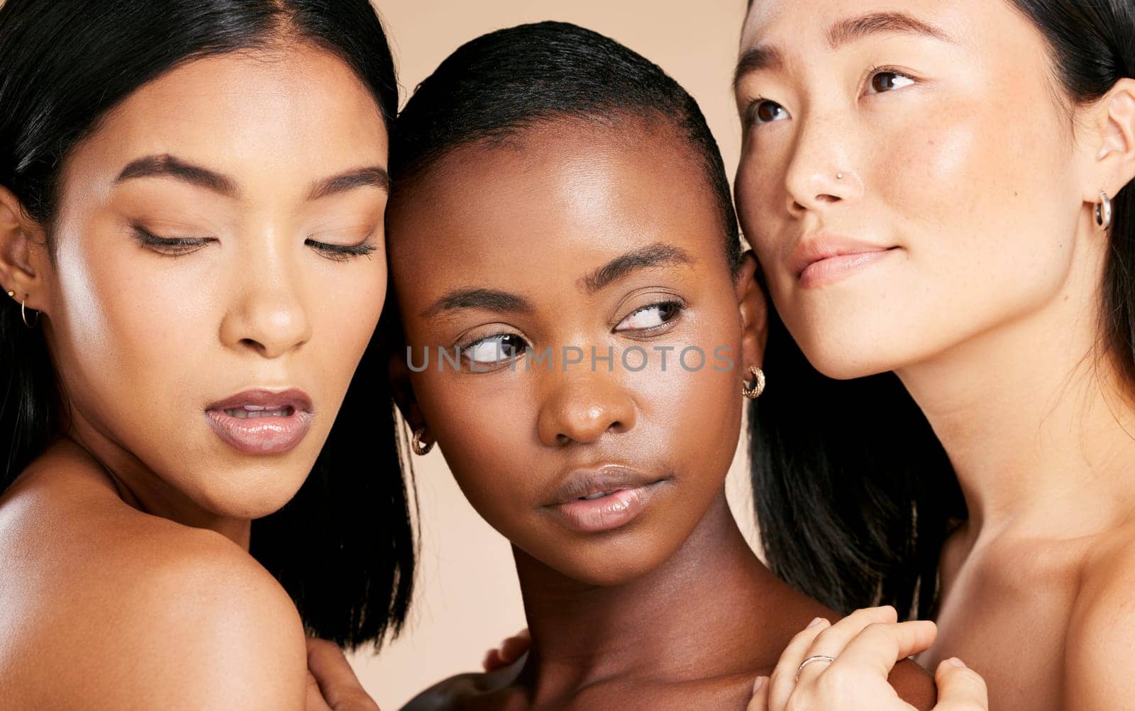 Skincare, cosmetics and diversity, women with beauty and wellness, cropped on studio background. Health, culture and luxury skin care for beautiful people with natural makeup for international market by YuriArcurs