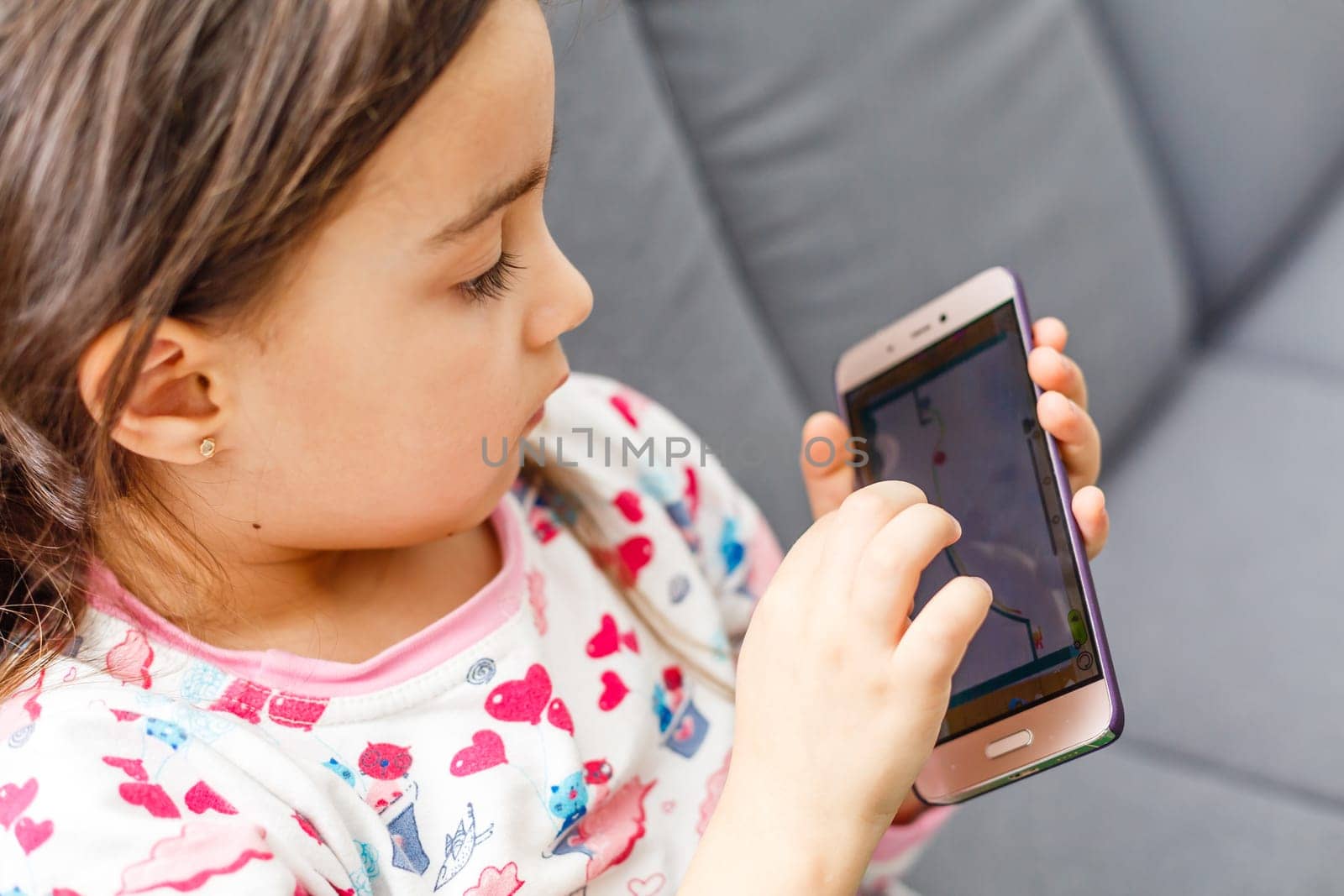 little girl with a smartphone.