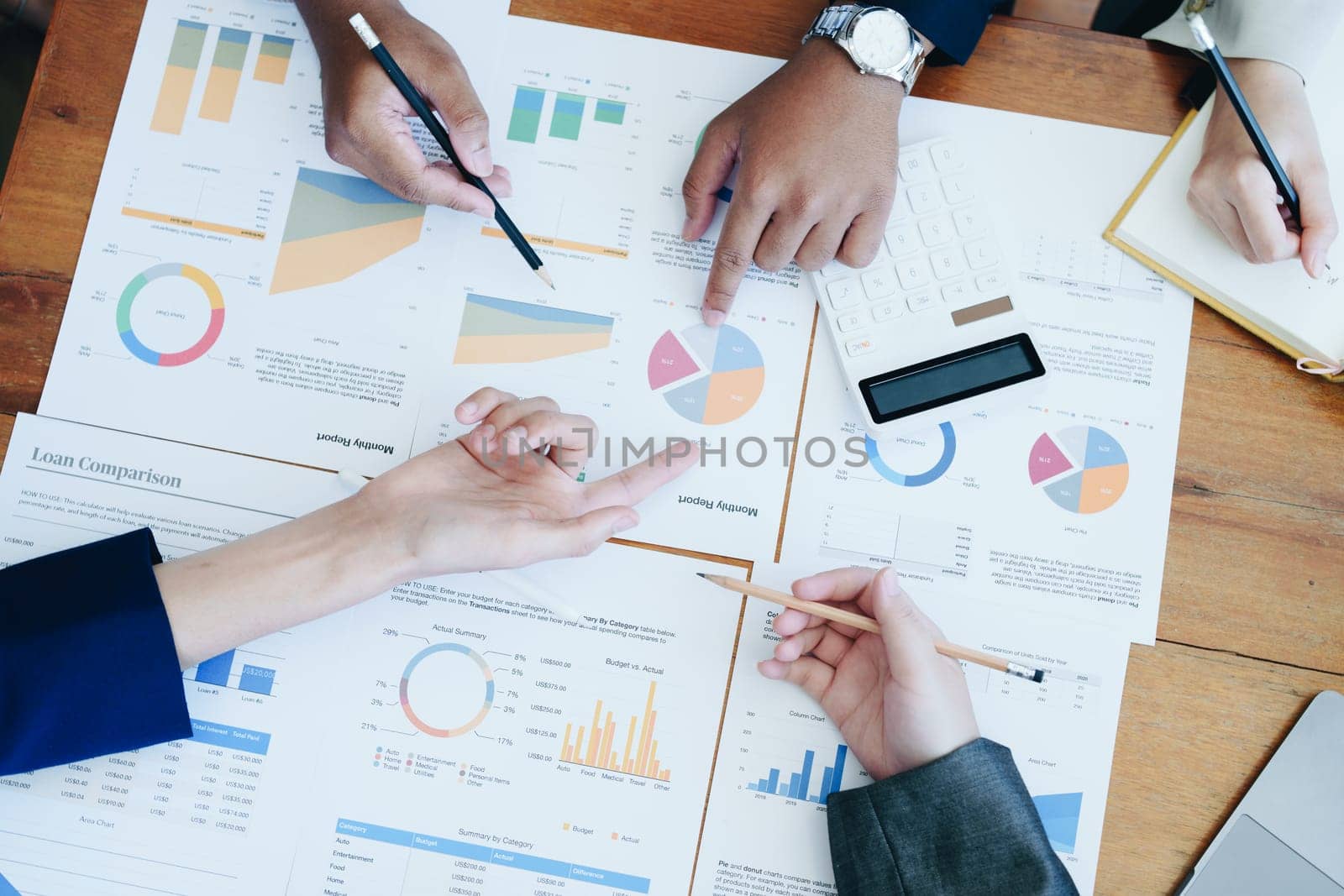 The company's businessmen meet and discuss to plan a marketing strategy and come to a conclusion on how to use the financial budget to avoid investment risks by Manastrong