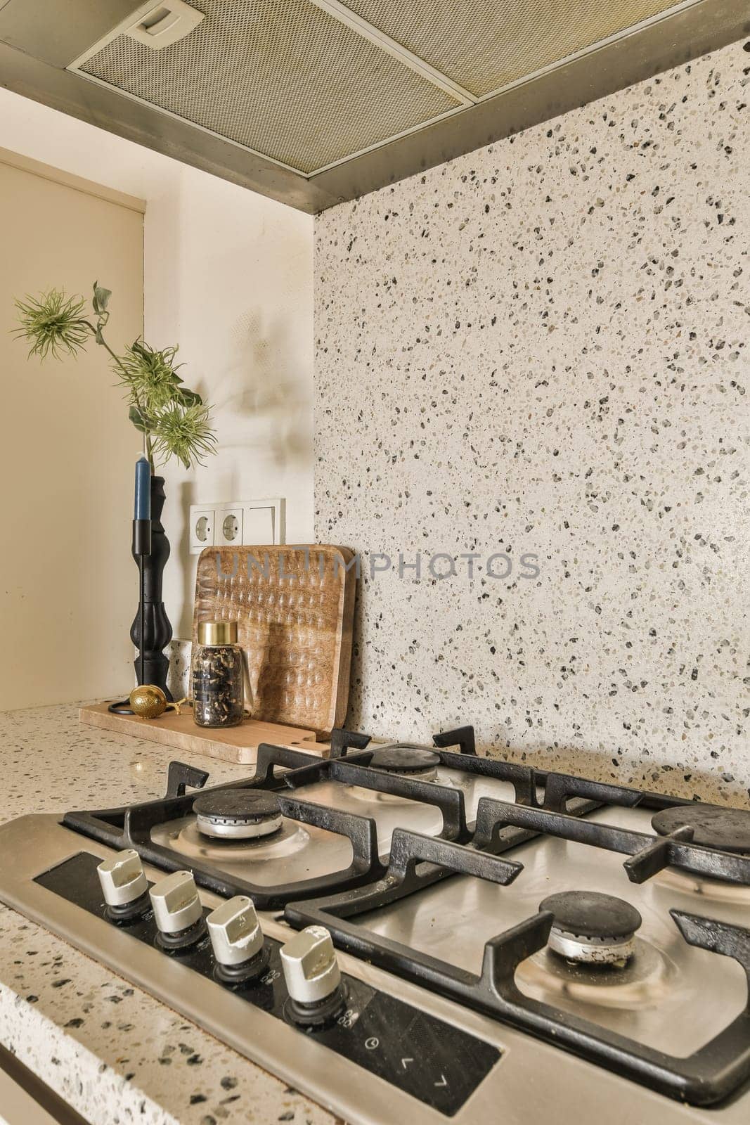 a kitchen with granite counter tops and stoves in the fore - image was taken from an article published on flickonly com