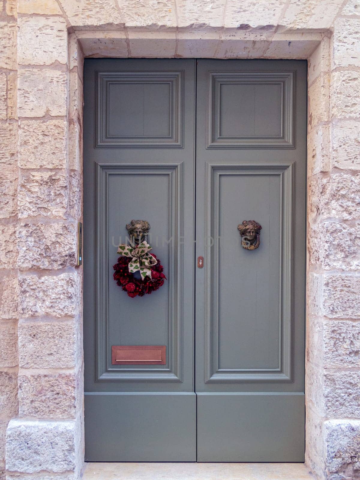 close up retro style old house door of Mediterranean architectural culture in Mediterranean island Malta. High quality photo