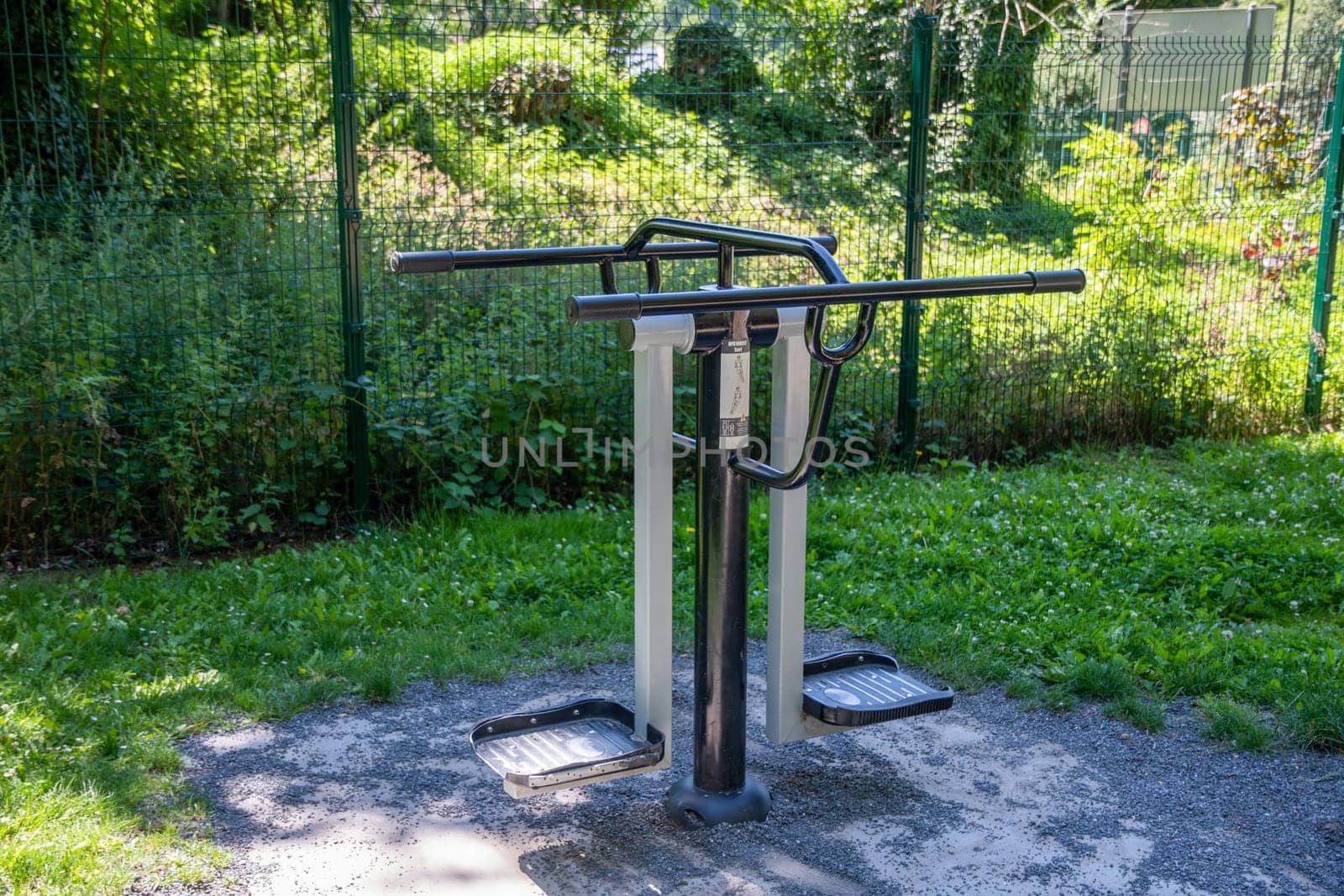 Exercise machines and fitness equipment in the street outdoor gym by KaterinaDalemans