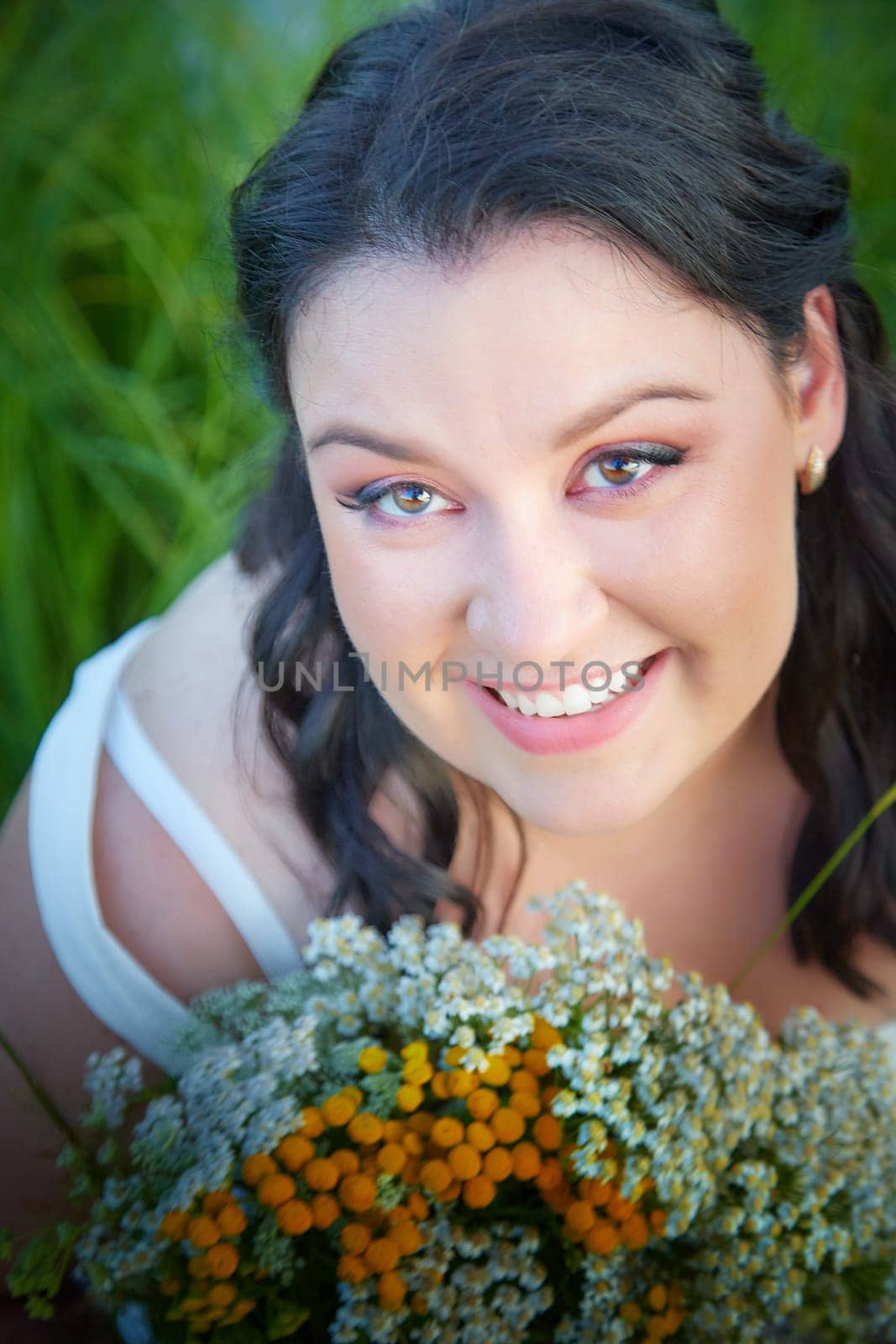 Portrait of Slavic plump chubby girl on the feast of Ivan Kupala with flowers on a summer evening by keleny