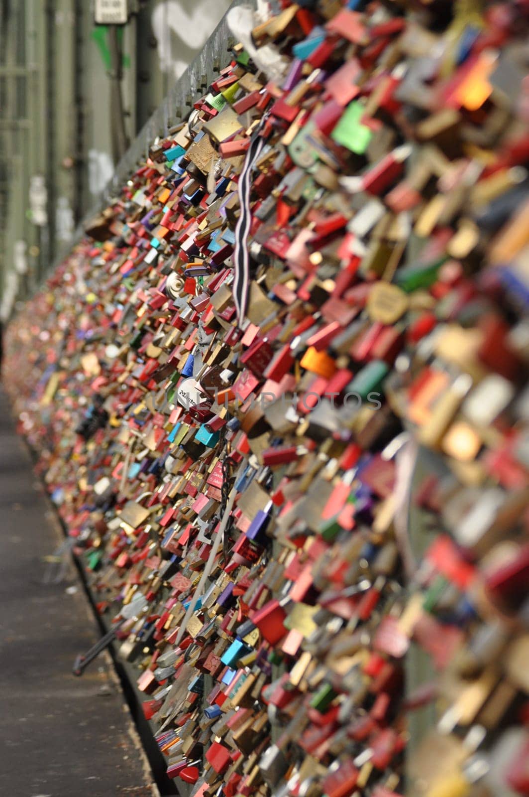 Dozens of love locks at a bridge in Cologne, Germany