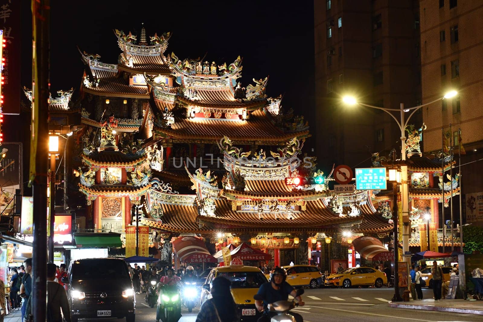 Songshan Ciyou Temple at night in Taipei, Taiwan