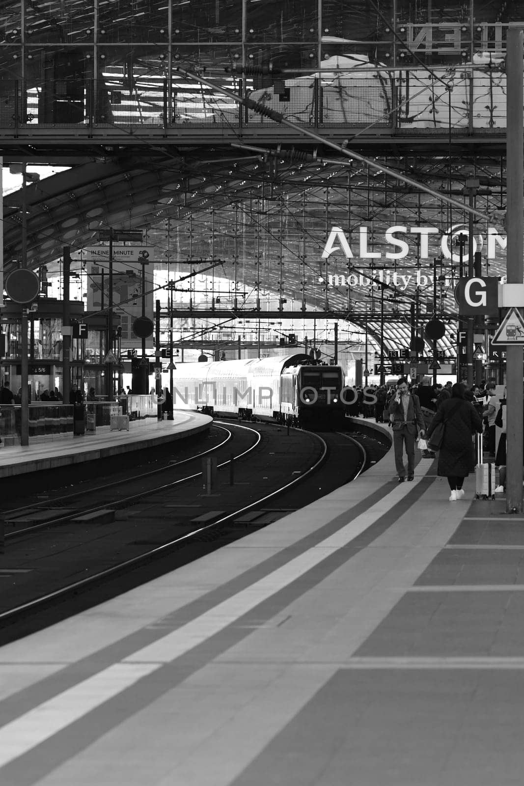 Vertical shot of a regional train RE entering Berlin main station in Berlin, Germany