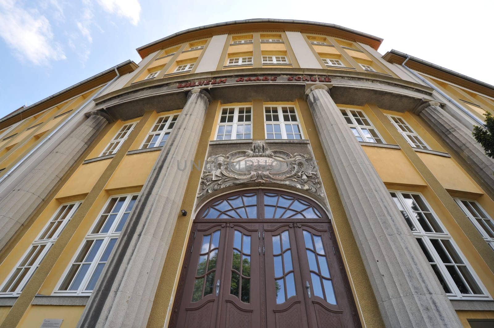 Low-angle shot of the Wilhelm Raabe School entrance in Wernigerode, Germany