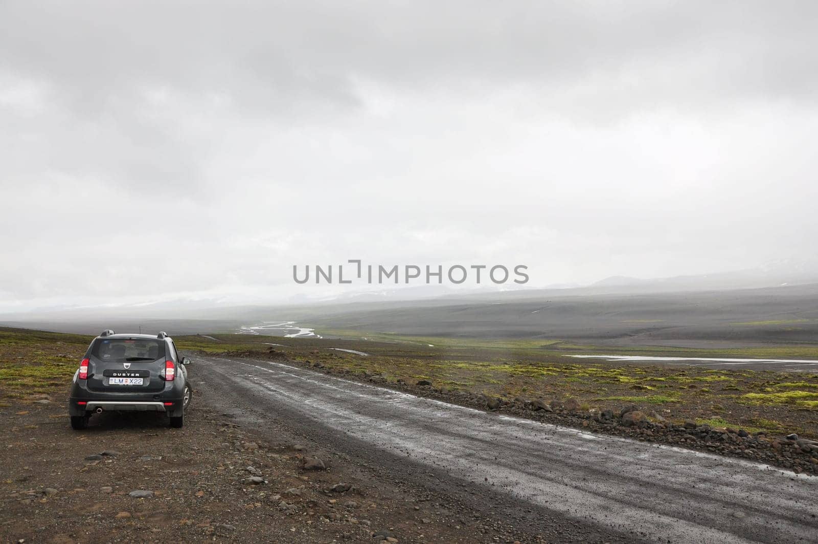 Grey Dacia Duster on one of Iceland's F-roads on a cloudy day