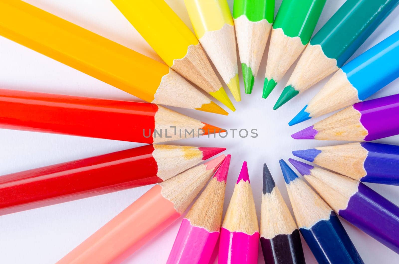 The colored pencils on a white background by Gamjai