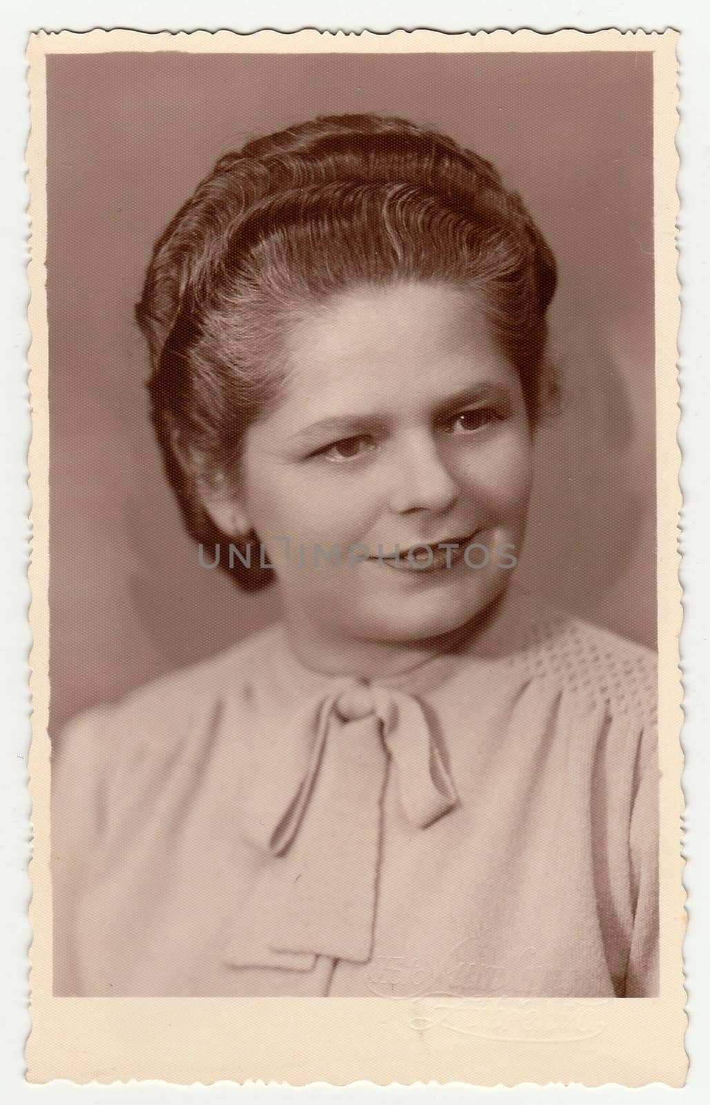 Vintage photo of a young woman by roman_nerud
